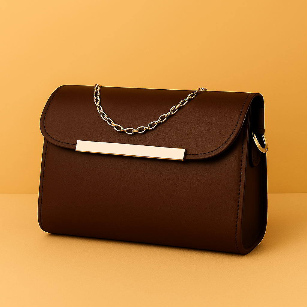 Brown handbag with a chain strap on an orange background