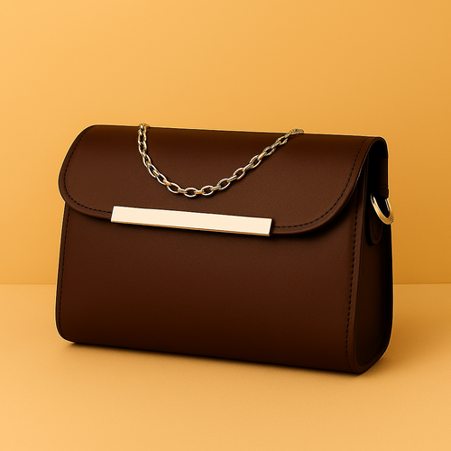 Brown handbag with a chain strap on an orange background